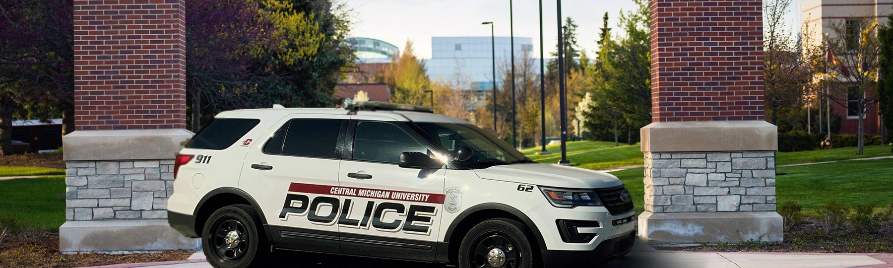 Central Michigan University Police vehicle under arches
