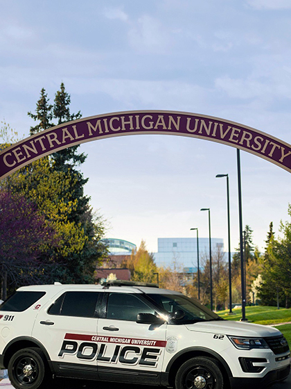Central Michigan University Police vehicle under arches