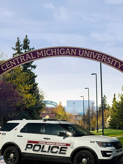 Central Michigan University Police vehicle under arches
