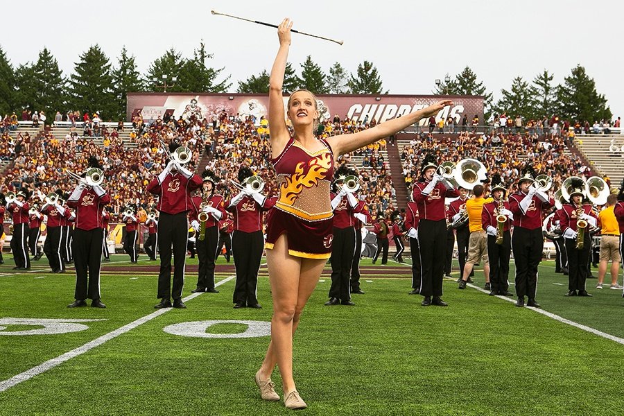 Delaney Schoenbine's twirler performance infront of the CMU band at a football game.