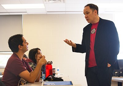 Author Jamie Ford speaks to students during Critical Engagements event