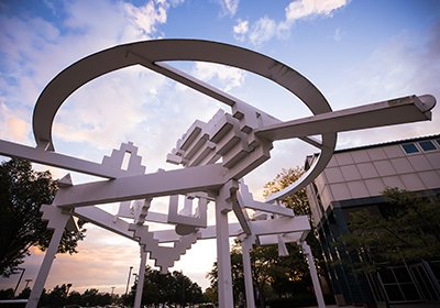 Modern sculpture in front of CMU academic building