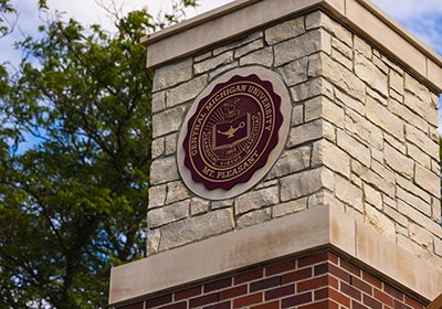 Central Michigan University seal on column