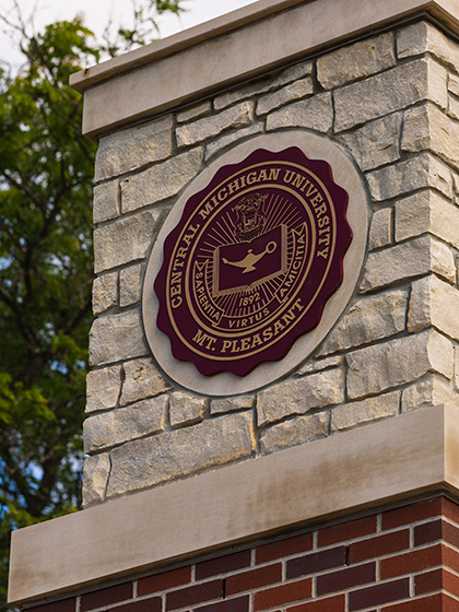 Central Michigan University seal on column