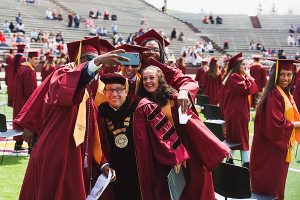 President Davies with graduates