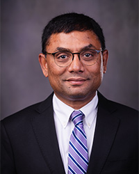 a man in a suit and tie