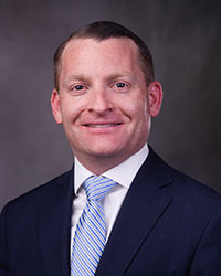 a man in a suit and tie