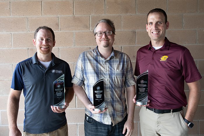 Derek Leib, Greg Hanley, and Mike Molter pose with their 2025 Standing Ovation Awards.