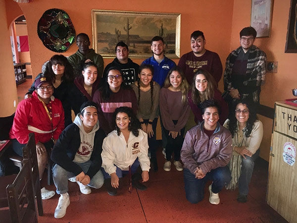 A Nosotros gathering: students and Officer Laura Martinez and Mimi Gonzalez-Barillas gather for an informal dinner at Taco Boy. picture credit: Manny Martinez