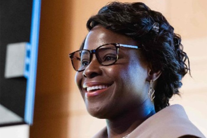 Close up of Dr. Kechi Iheduru-Anderson smiling as she presents at the CMU Diversity Symposium