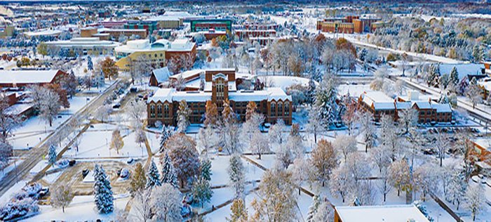 Drone shot image of cmu and warriner hall during winter with snow