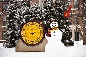Snowman in front of CMU Seal