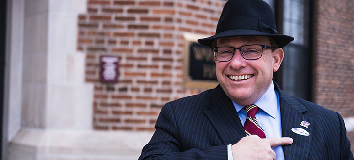 CMU President Bob Davies with I voted sticker