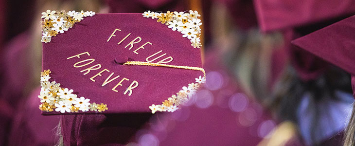 Fire Up Forever commencement cap