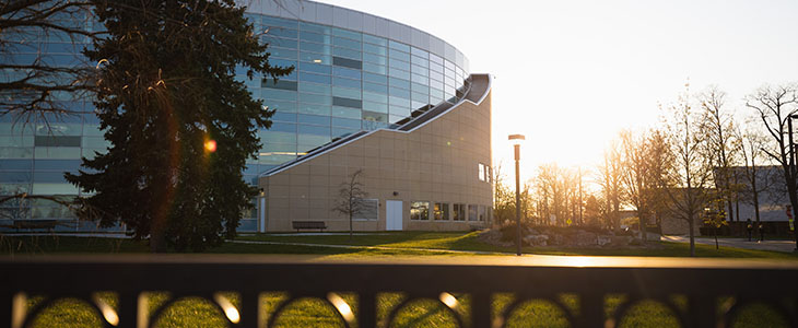 CMU Park Library at dusk with sun setting