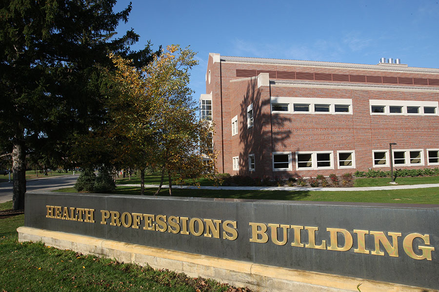 Exterior photo of Central Michigan University's Health Professions Building on a sunny day