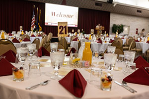 Close up of one of several tables set up for a scholarship event dinner at Central Michigan University.
