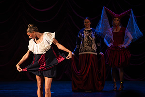 Three female models in renaissance-style clothes participate in the student-run Treads Fashion Show at Central Michigan University
