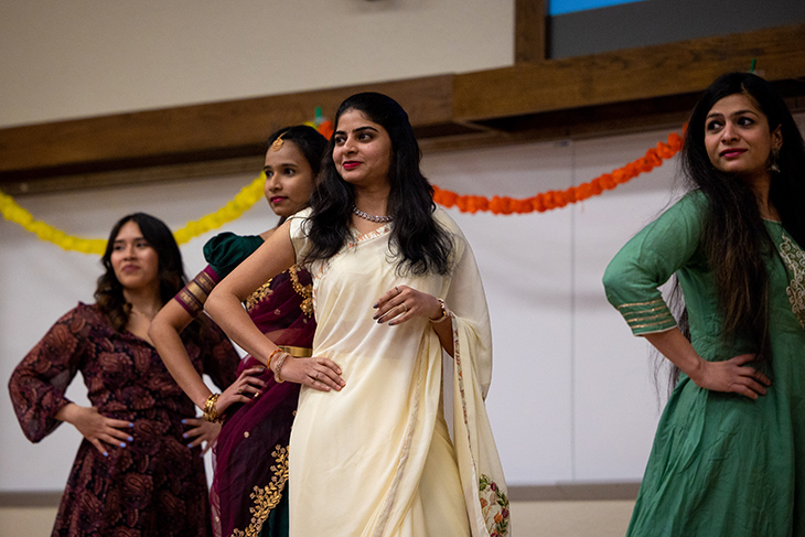 A group of students model their outfits during Indian Night, 2022. This image was taken on Friday, March 25th in Pearce Hall.