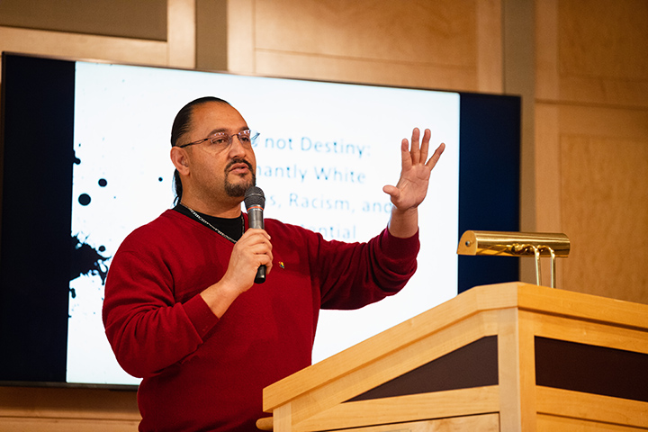 Diversity symposium keynote Dr. Nolan Cabrera from Arizona University speaks about DEI on college campuses.