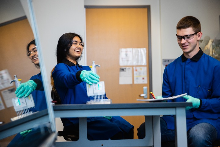 Daniel Swanson (right) and Ishani Gaidhane are Bio Chemistry majors working in Associate Professor Ben Swarts’ lab on the fourth floor of the BIO building.