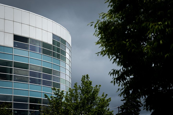 Ominous dark clouds over the Charles V. Park Library give warning of a much needed July rainstorm.