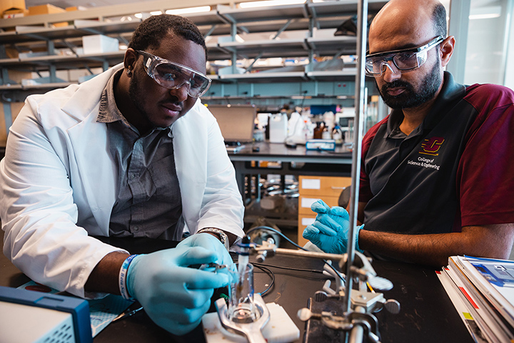 Mechanical engineering major Donovan Pits-Reed studies the durability of 3D-printed steel with his mentor, faculty member Ishraq Shabib.