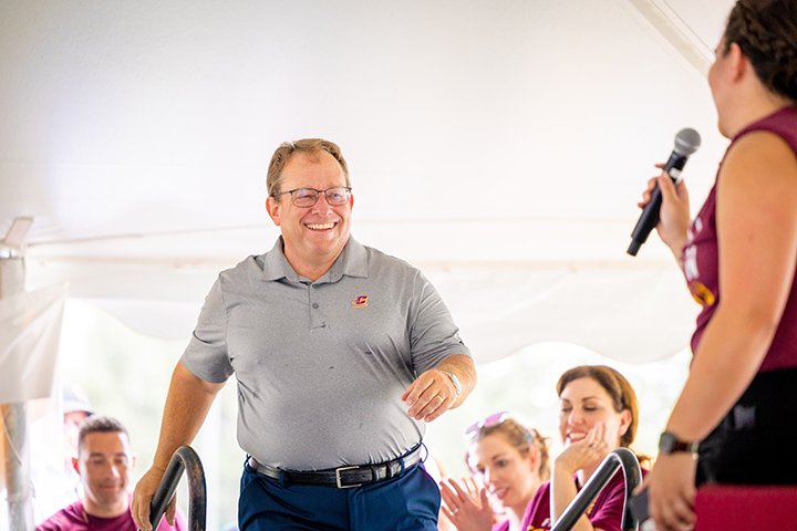 CMU President Bob Davies prepares to address attendees at the 2022 Alumni Reunion Weekend.