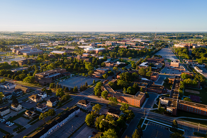 A bird's-eye view of CMU’s campus just after sunrise.