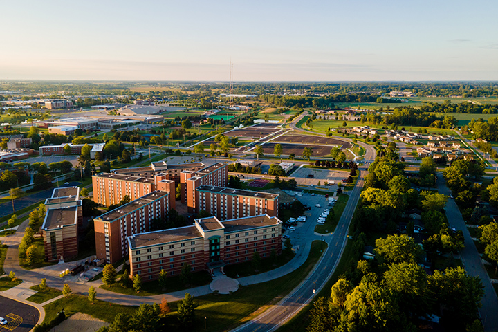 An aerial view of Central Michigan University’s campus during the golden hour, just after sunrise.
