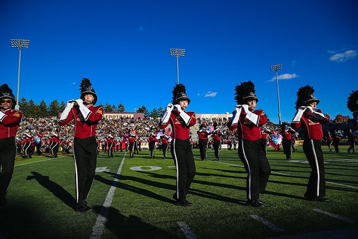 The CMU Marching Band performs on the field inside Kelly/Shorts stadium.