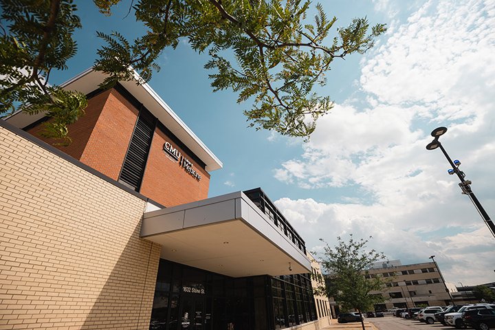 A beautiful day outside the CMU College of Medicine Saginaw Education Building.