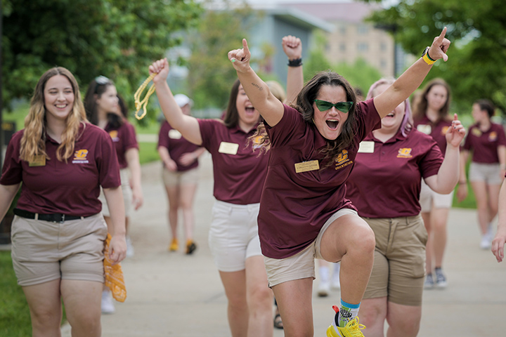 CMU’s talented team of orientation leaders get hyped while preparing for Freshman Orientation. This photo was taken on Thursday, May 26 while walking towards the Park Library.