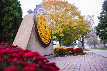 Central Michigan University seal in Warriner Mall.