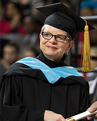 Kathy Wilbur attends a 2015 CMU commencement ceremony.