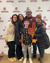 CMU faculty member Nick Hussein and his family prepare for the Thanksgiving parade.