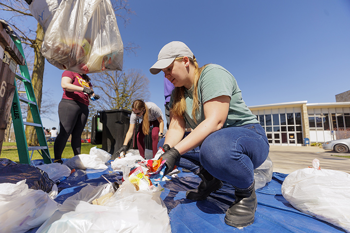 CMU students sort through trash and recycling during the annual waste audit.