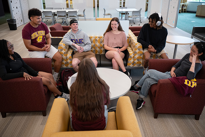 A group of people sitting in a circle