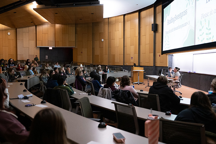 A group of people in a lecture hall