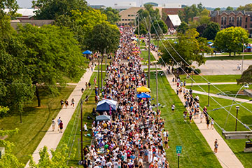 An overhead view of a crowded street festival during CMU MainStage.