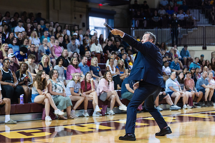 Inside McGuirk Arena, CMU President Nail MacKinnon addresses attendees of Discover CMU day