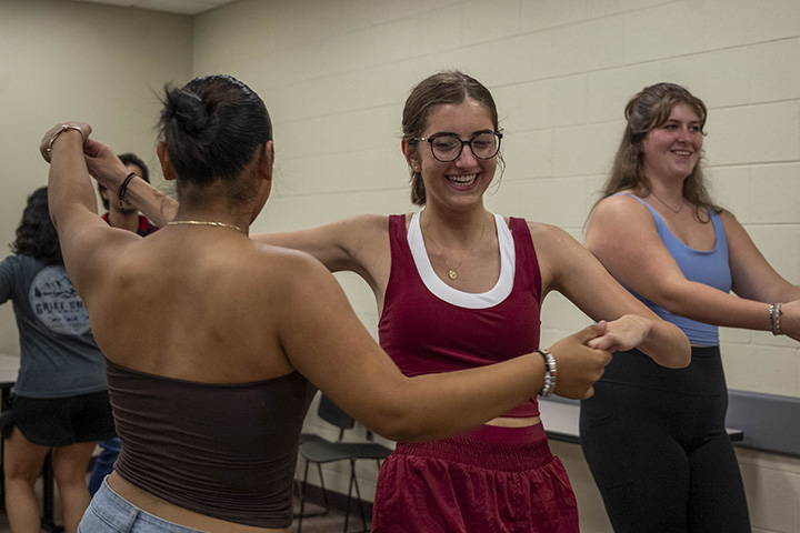 CMU students dance in a classroom