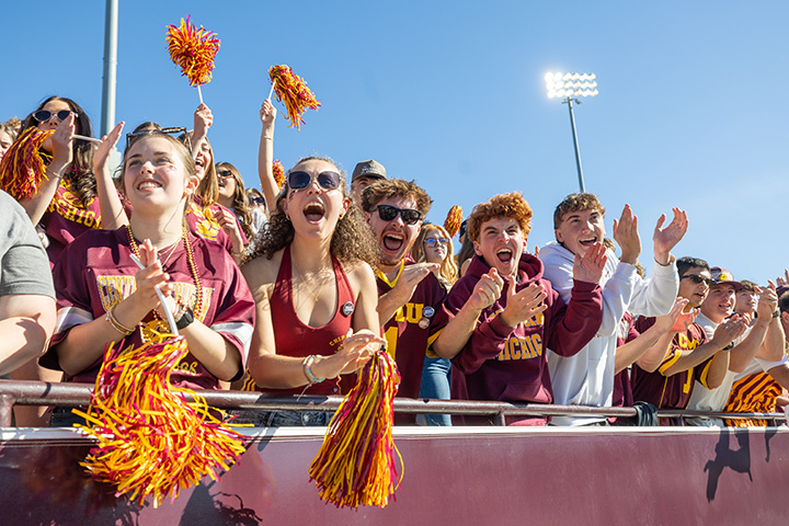 CMU students cheer wildly from the stands