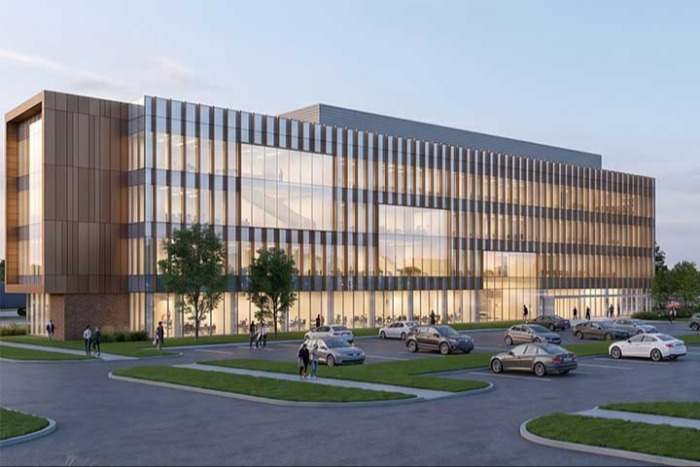 An architectural rendering of a multistory wood, glass and metal medical education building.