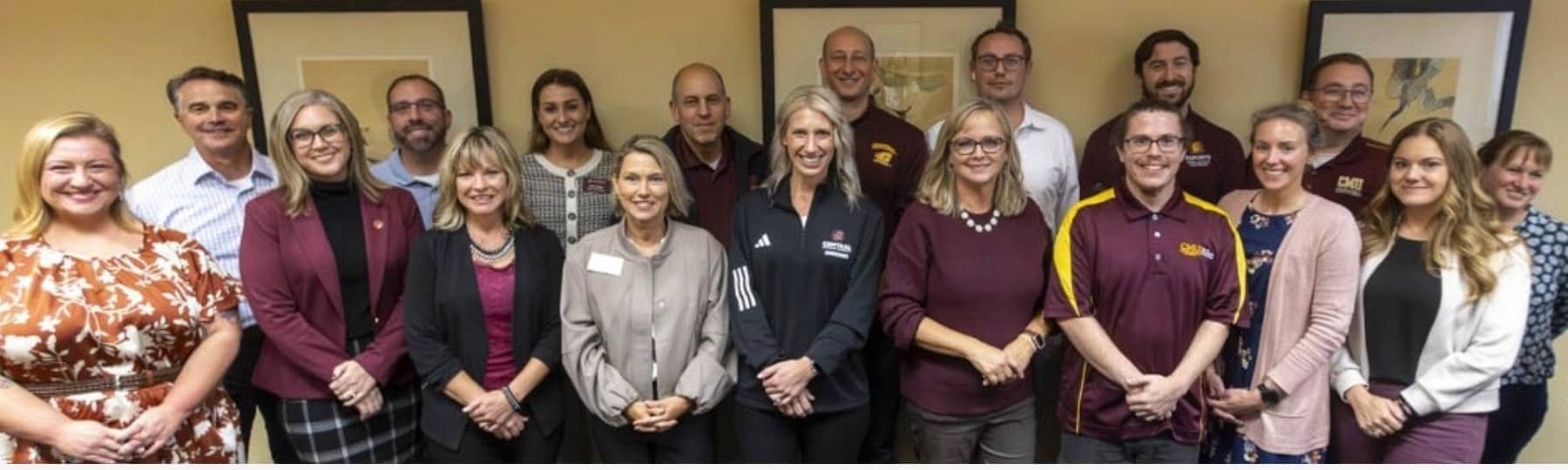 a group of people posing for a photo