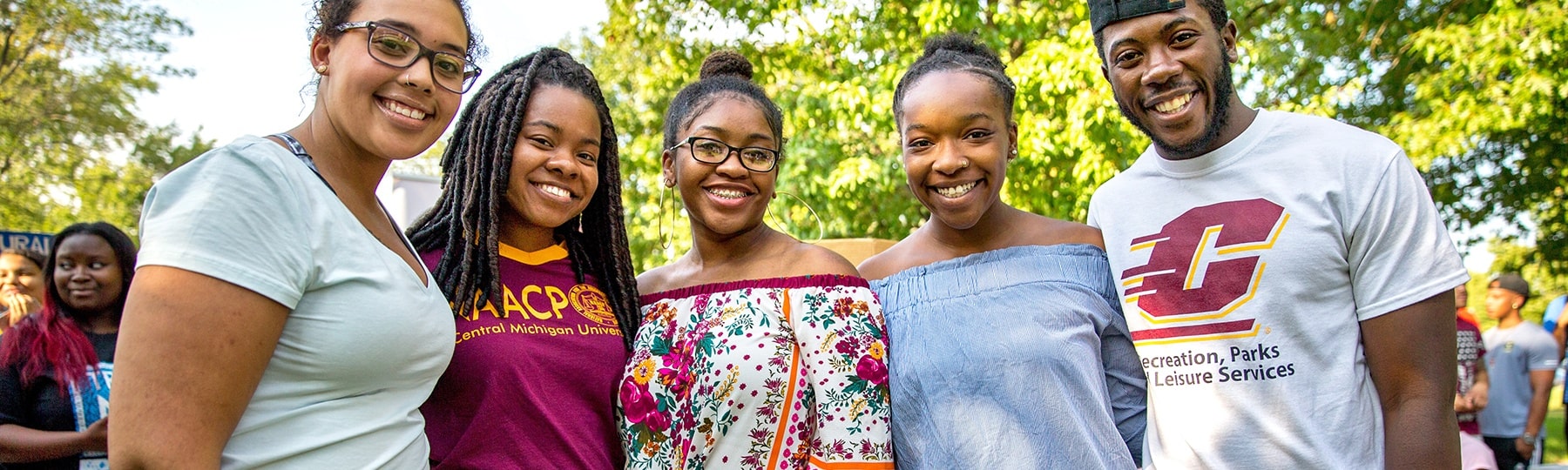 Students smile for camera at Get Acquainted Day