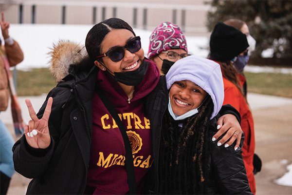 Two students posing for a picture