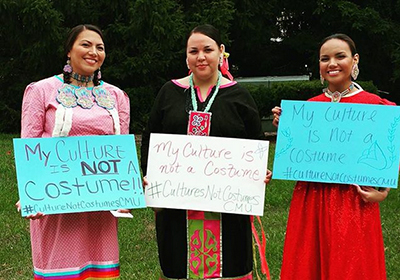 Native American women in traditional clothing