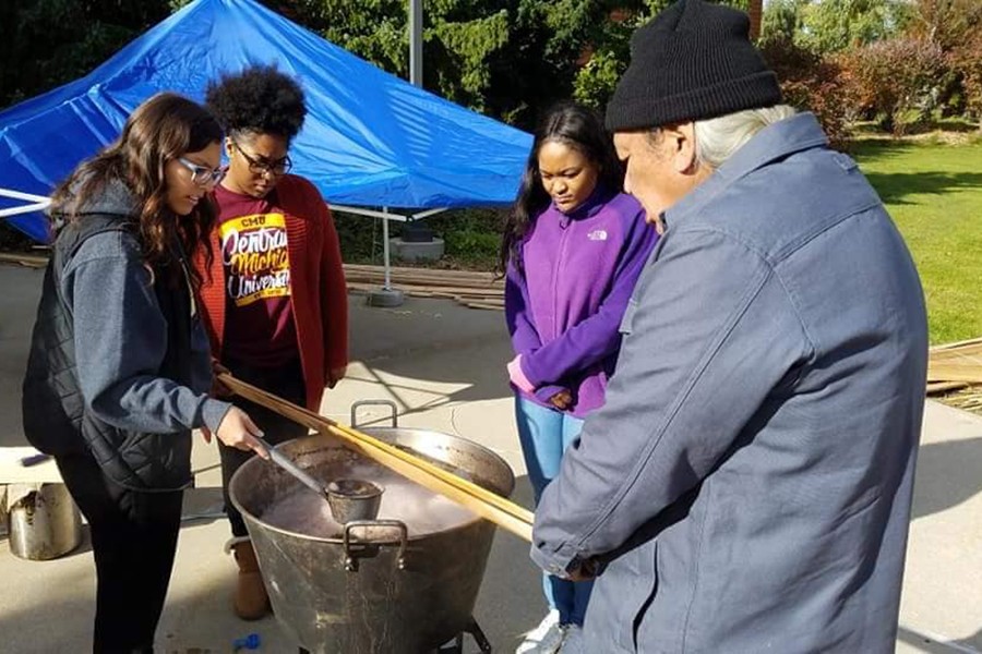 Students and community members engage in Indigenous Peoples' Day activity