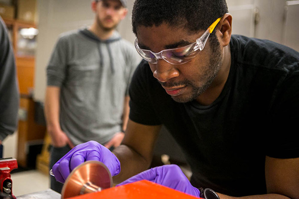 Student working in a physics lab